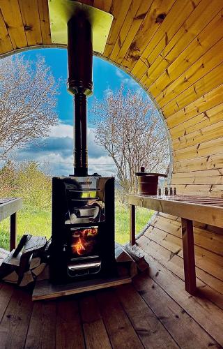 Sauna Panoramique chauffé au feu de bois